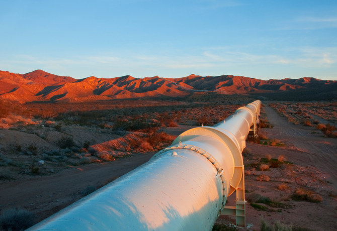 beautiful,sunrise,lighting,on,a,pipeline,in,the,mojave,desert.